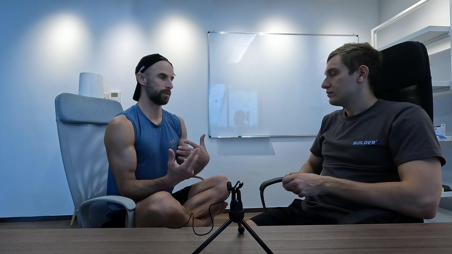 Konrad and Anton in conversation during the LuminaLog product discussion