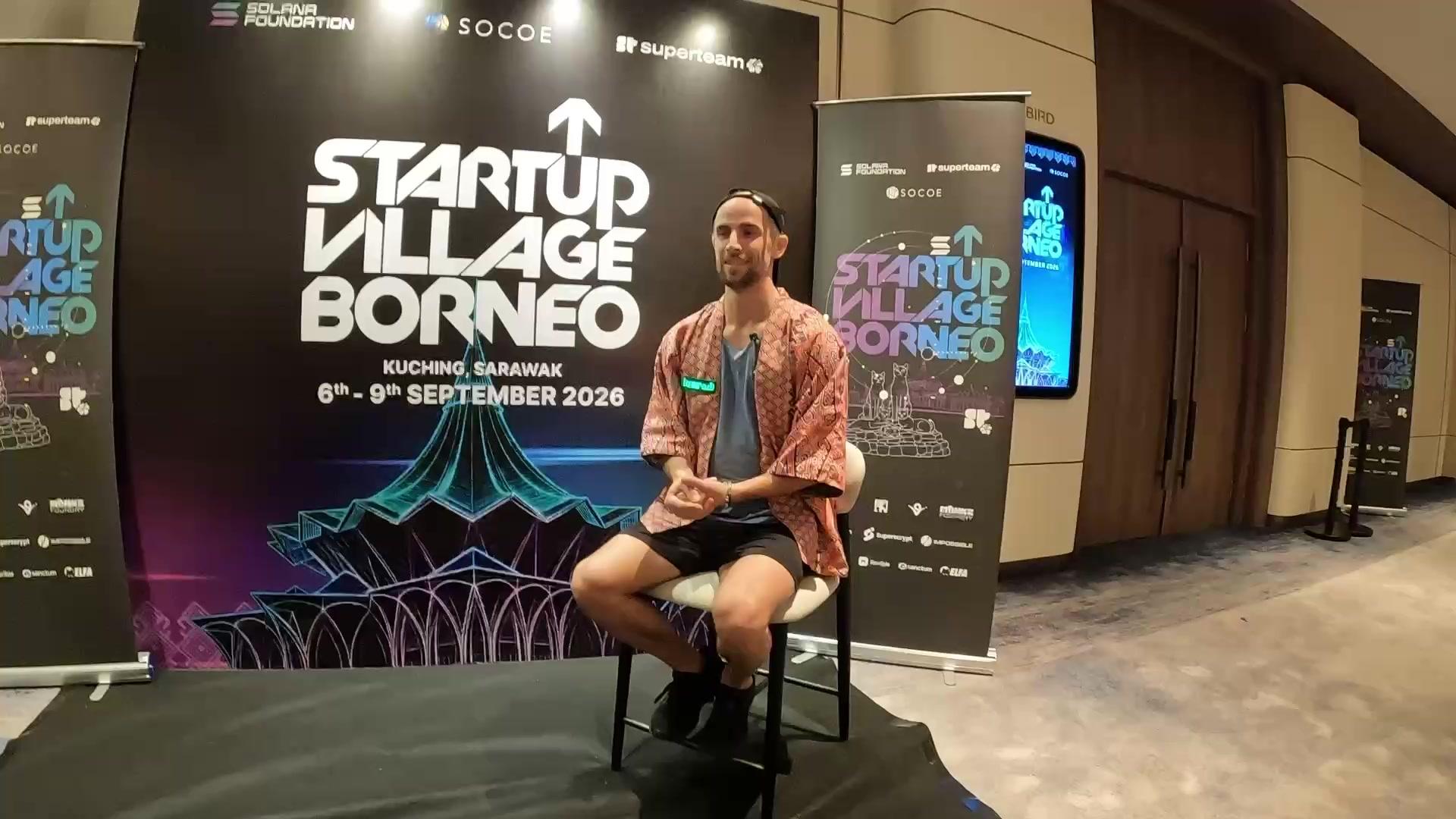 The post-pitch interview in front of the Startup Village Borneo backdrop